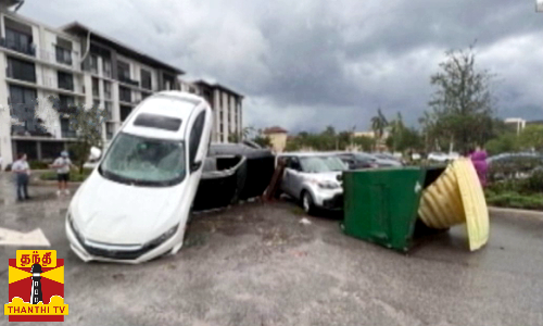 சூறாவளியால் கதி கலங்கி போன அமெரிக்கா..வேரோடு முறிந்து சாலையில் விழுந்து கிடந்த மரங்கள்..!