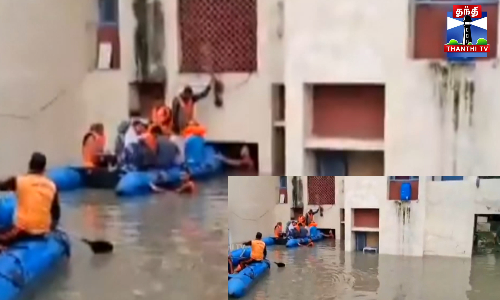 விடுதியை சூழ்ந்த வெள்ளம்- 45 மாணவர்கள் படகு மூலம் மீட்பு